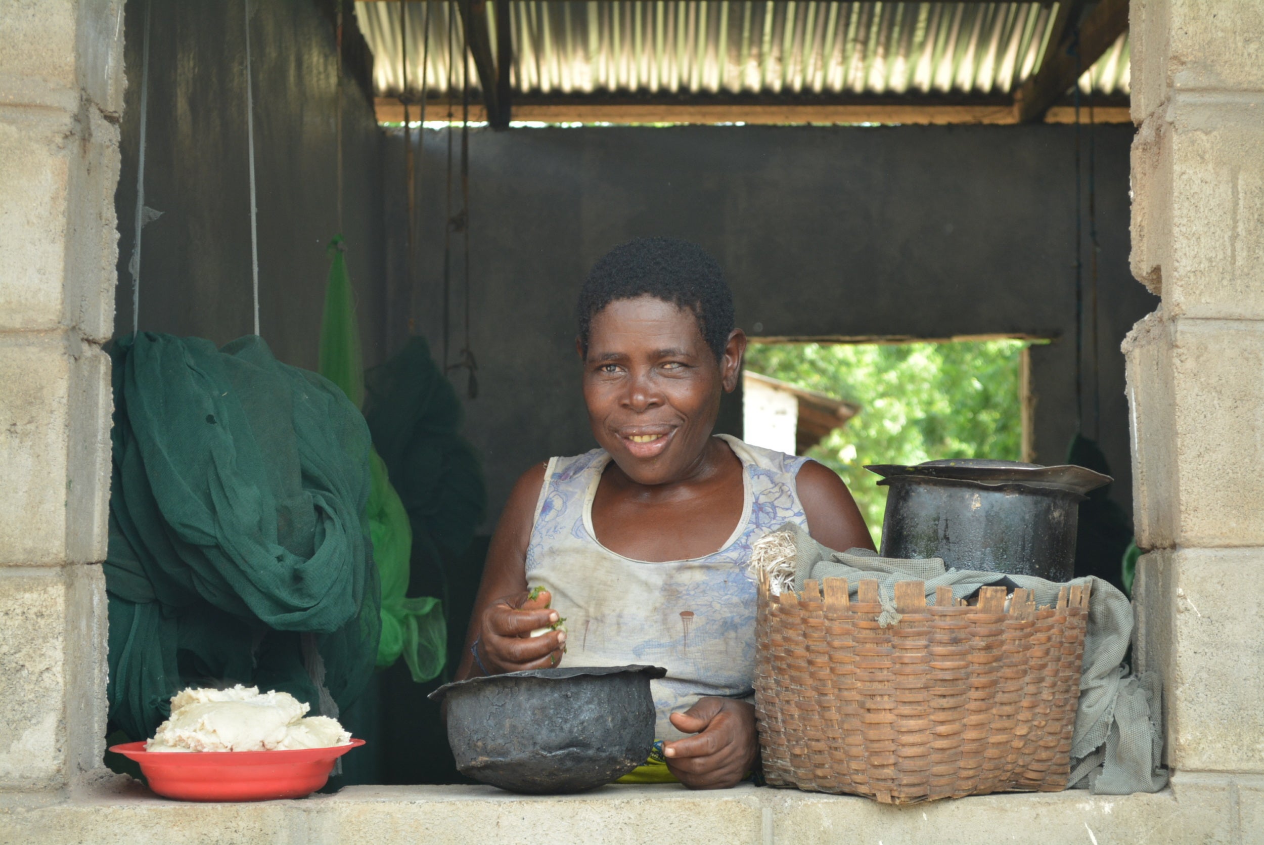Jina Fungo from Chilanga village in Nsanje, Malawi moved in a CARE-supported evacuation center before floods hit her area. “We can cook in the evacuation center even when it’s raining,” she says. “But when you are in a tent, it’s not possible as it can catch fire.