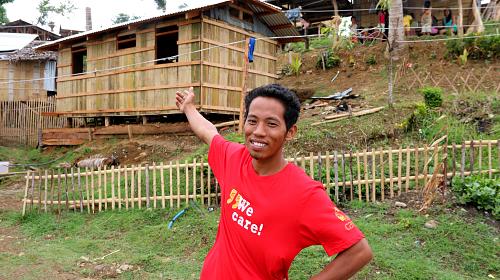 Marvin also works as part time carpenter. He's happy to show here the house he himself built with shelter repair kit and cash assistance-support from CARE. CARE