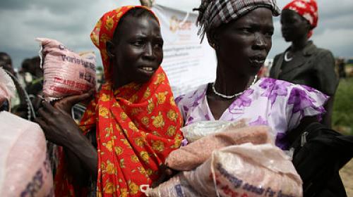 Woman receives seeds to plant after being displaced by South Sudan conflict. PHOTO: Josh Estey/CARE