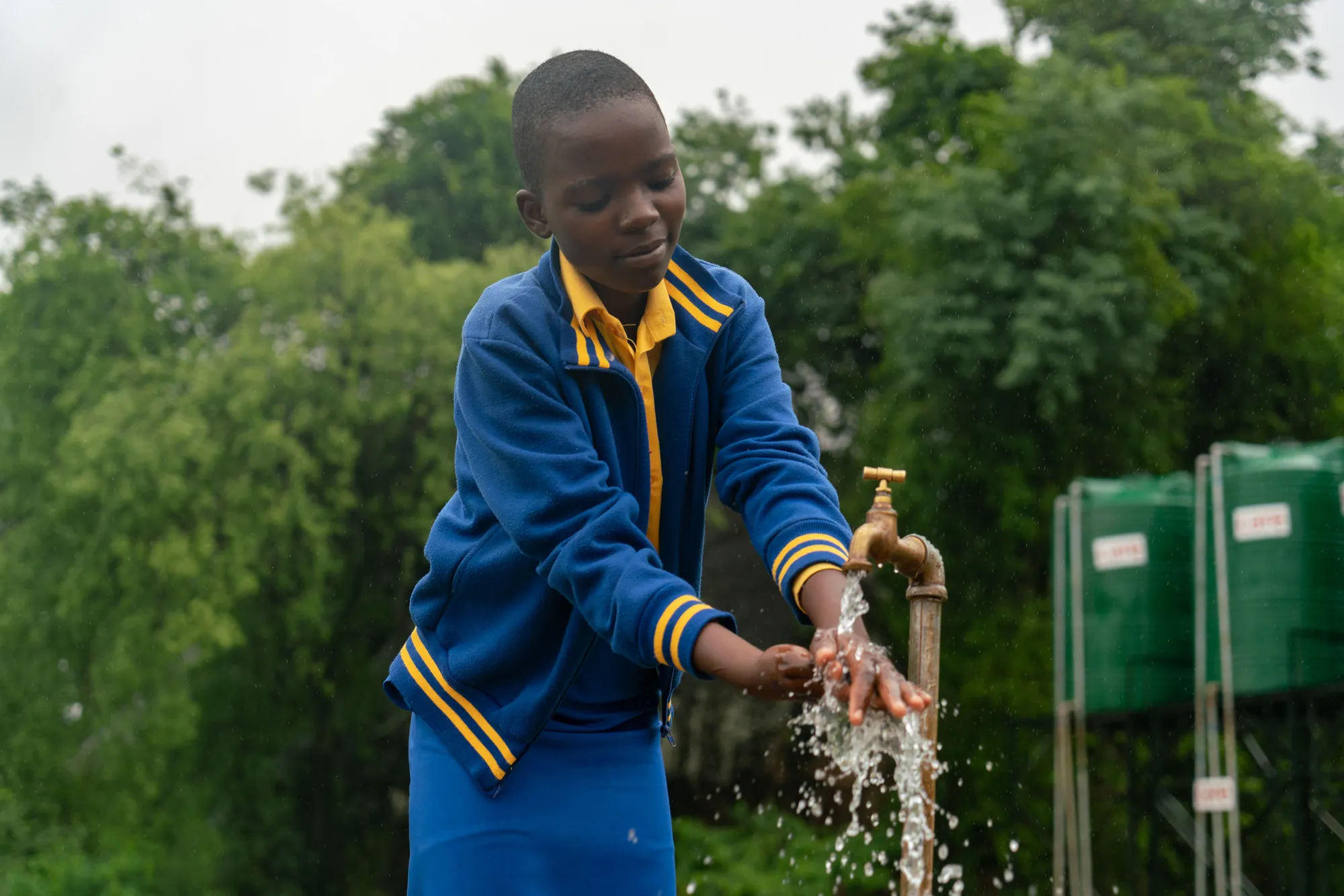 A hand-washing station at a school in Zimbabwe. Photo: © Lucy Beck/CARE