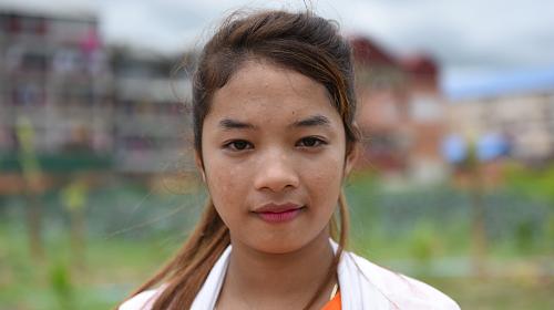 A factory worker in Cambodia, Bopha, who experienced sexual harassment at work. Credit: CARE