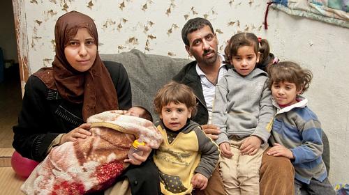 Relentless violence has forced millions of Syrians like Samah (left) and Darwish and their four children from their homes as they seek safety in other parts of Syria or beyond.