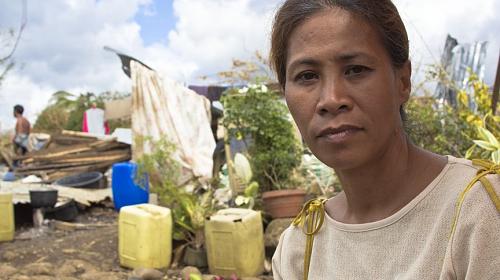 Asusina Ngoho Alonzo's home was destroyed by Typhoon Haiyan in the Philippines. Her family found scap materials that they used to build a temporary 