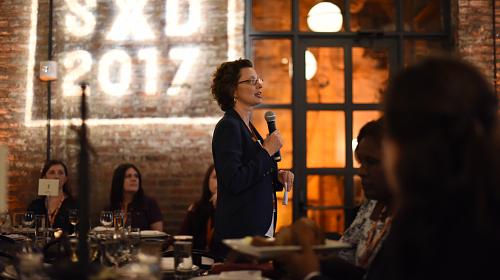 Michelle Nunn speaks at CARE's Scale X Design Challenge event in New York.