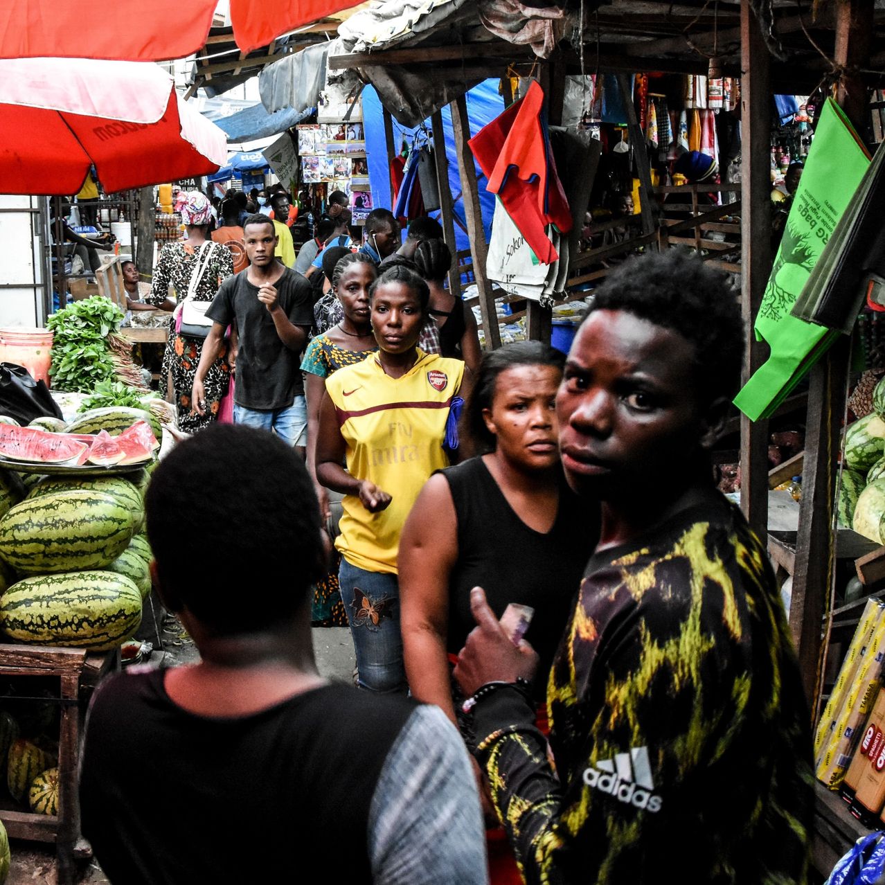 People walked at a market without adhering to social-distancing rules amid a coronavirus outbreak in Dar es Salaam, Tanzania, in April. ERICKY BONIPHACE/AGENCE FRANCE-PRESSE/GETTY IMAGES
