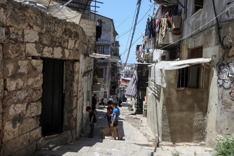 Boys play along an alleyway in Tripoli, northern Lebanon July 1, 2020. REUTERS/Mohamed Azakir