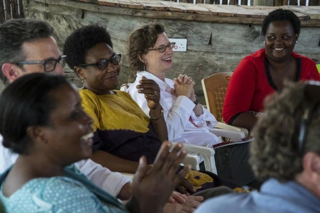 Michelle Nunn, president and CEO of CARE USA, visits with members of VSLA groups in Goba, Tanzania on Monday July 2, 2018. CAREY WAGNER/CARE