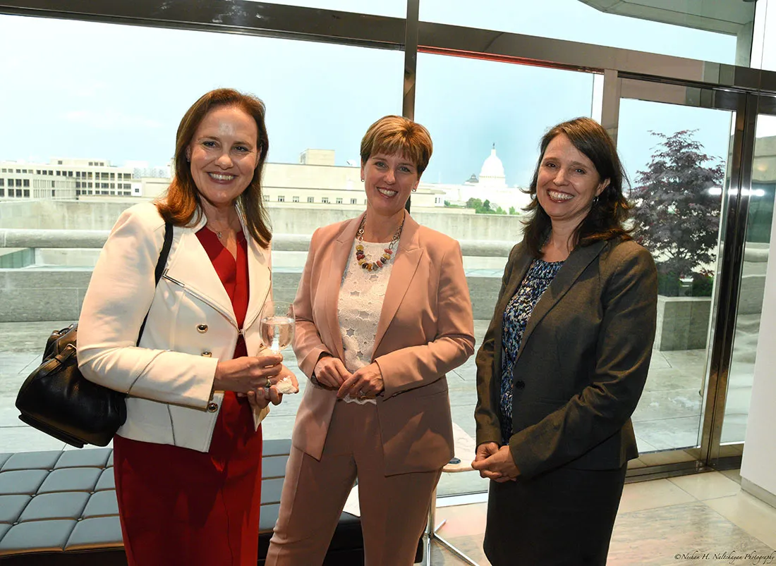 Michéle Flournoy, Minister Marie-Claude Bibeau, and another woman stand together.
