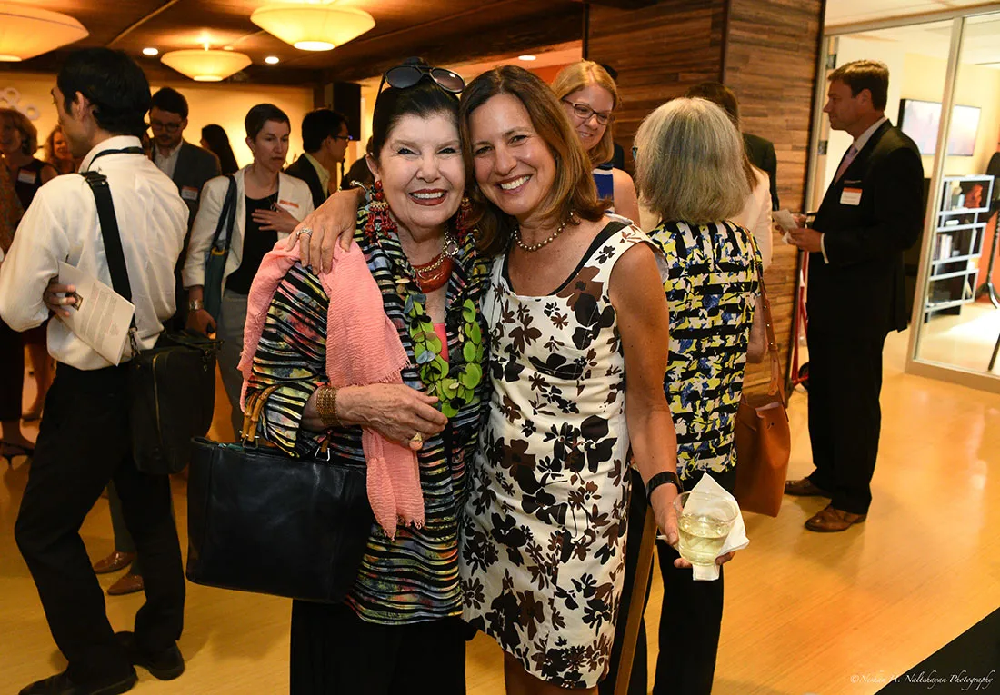 Beth Solomon poses with a woman attending the Global Leaders Network group.