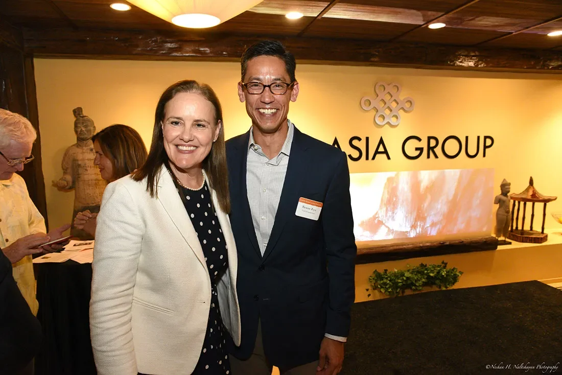 Former Under Secretary Michéle Flournoy stands with Rexon Ryu, partner of The Asia Group.