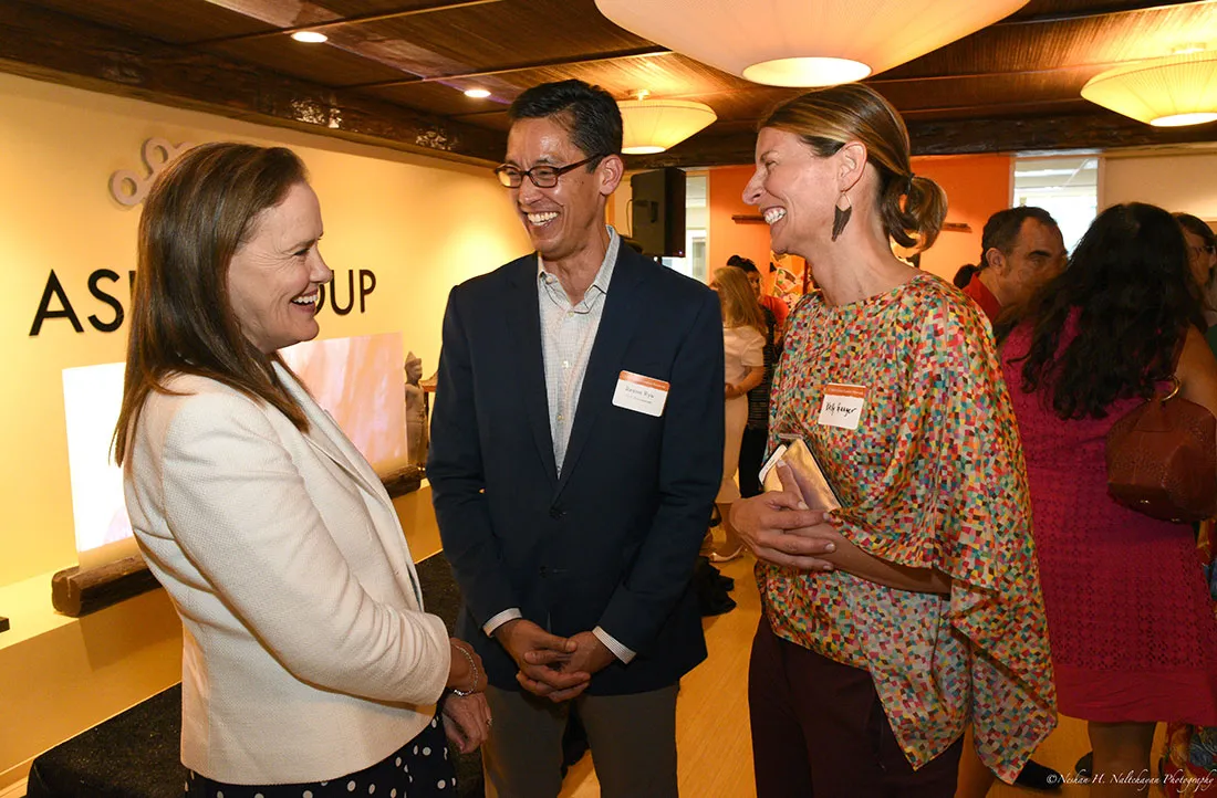 Former Under Secretary Michéle Flournoy speaks with Rexon Ryu, partner of The Asia Group, and an attendee.