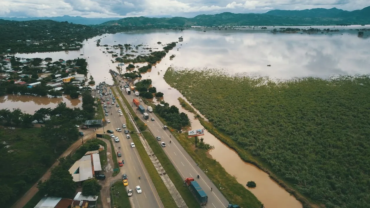Flood waters engulf a road in Honduras.