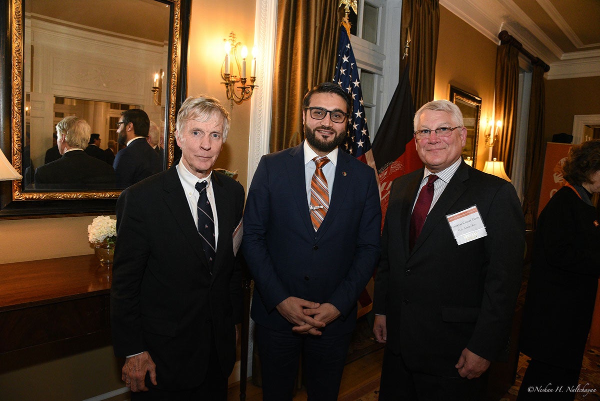 A man stands next to Ambassador Hamdullah Mohib and Ambassador Ryan Crocker