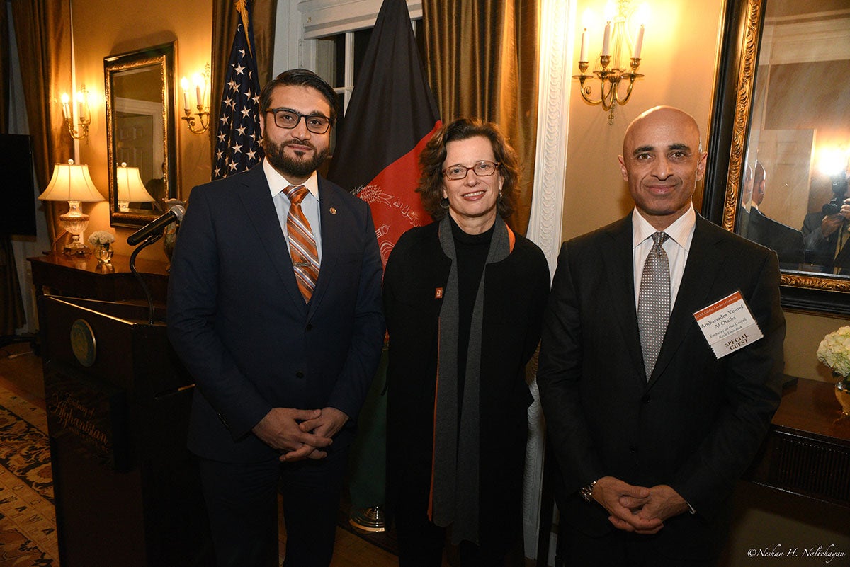 CARE CEO Michelle Nunn and Ambassador Hamdullah Mohib stand next to a man holding in a black suit
