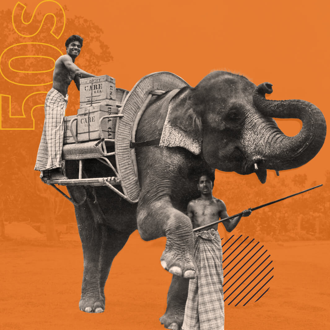 A black-and-white image of a man stacking CARE Packages onto a platform atop an elephant.