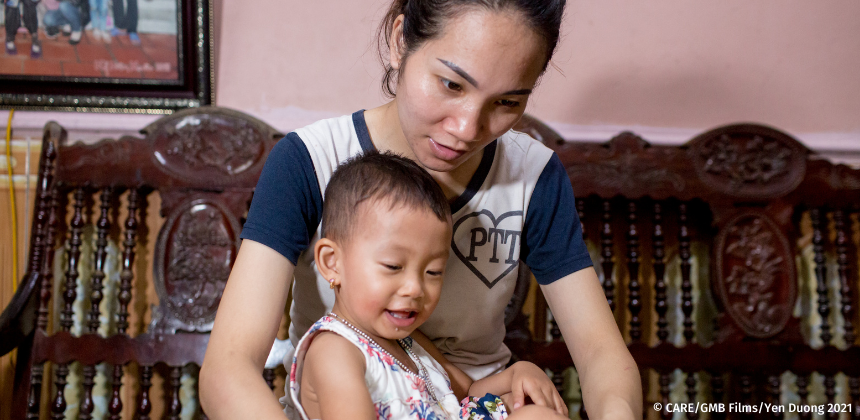 Chung, a garment worker, with her daughter