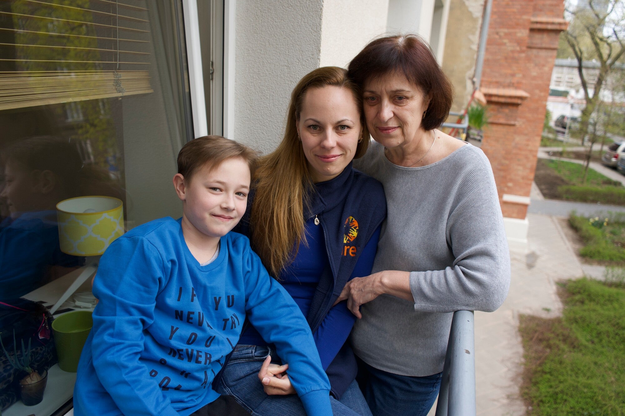 Portrait of Daria with her son and mother