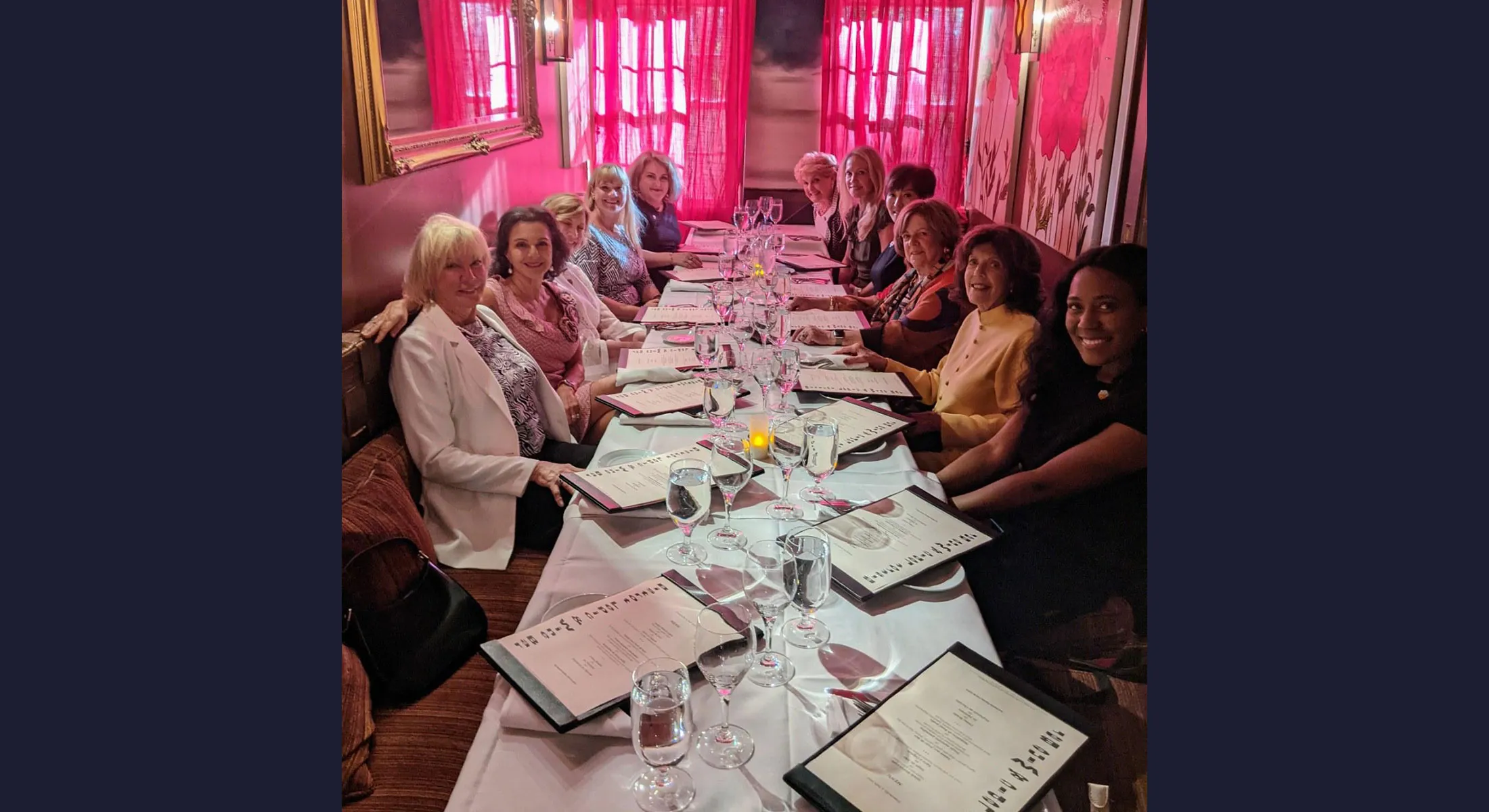 Ten CARE Women’s Network members and CARE staff connecting over dinner.