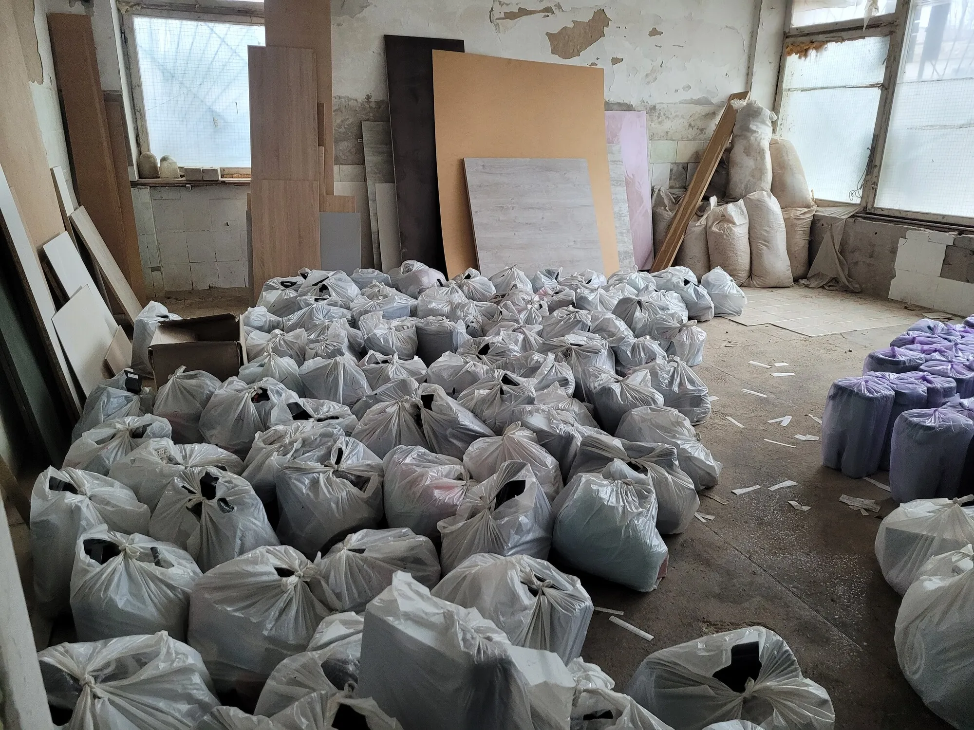 A room filed with bags of supplies