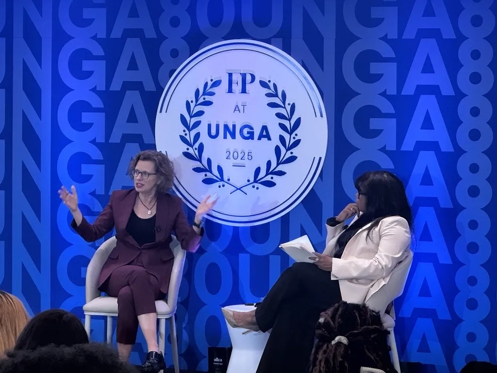 CARE President speaks on stage at UNGA 2025