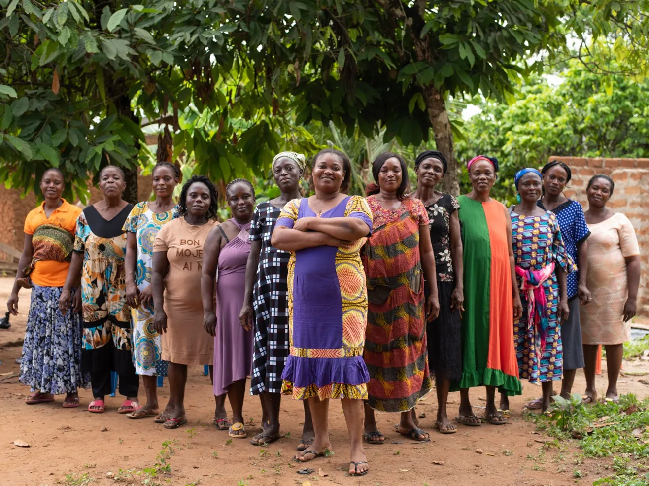 Group of women invovled in the VSLA program standing together