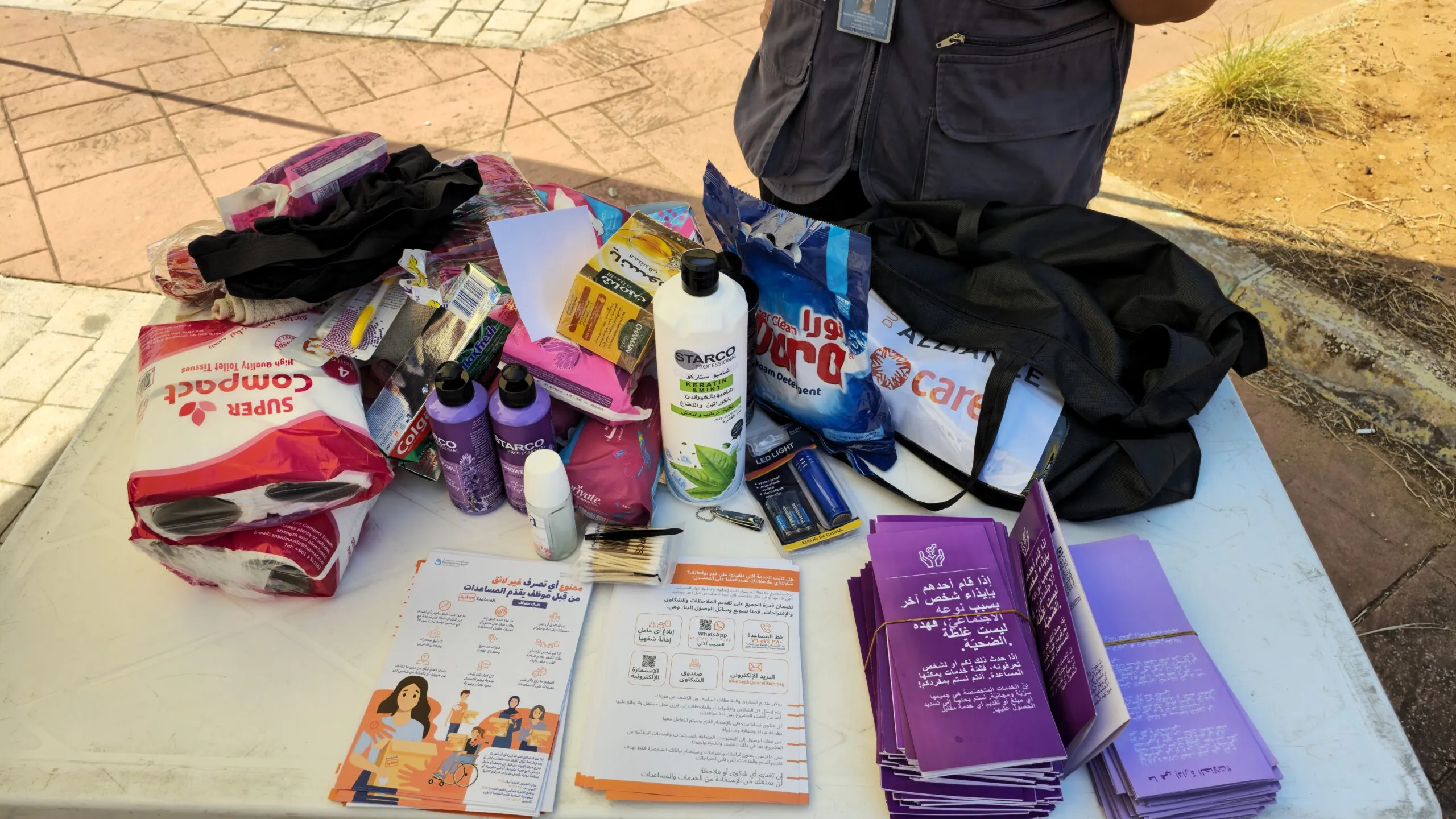 An array of dignity items from a distribution in Beirut, including menstrual supplies, hygiene supplies, and more.