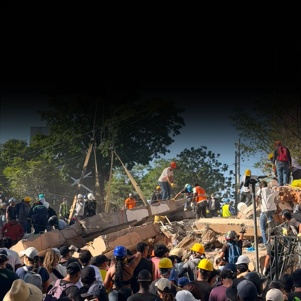 Search and rescue efforts underway at a devastated building in Colombia
